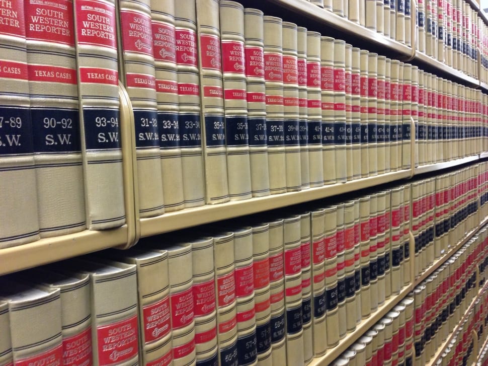 library-rows-of-books-law-books-wallpaper-preview – Mallon Legal